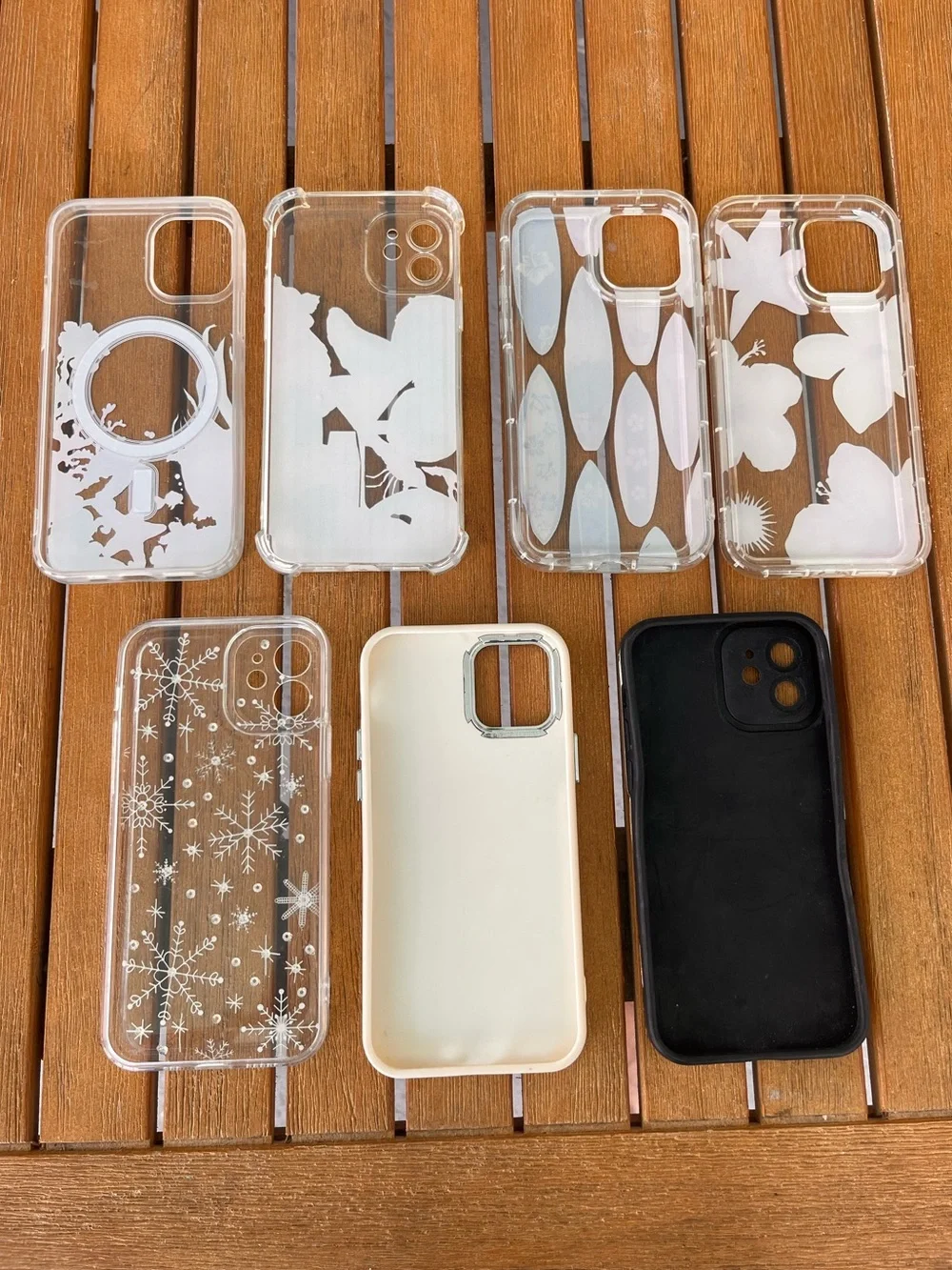 Bundle of 7 iPhone 12 mag safe cases with clear, coastal, and fun printed styles